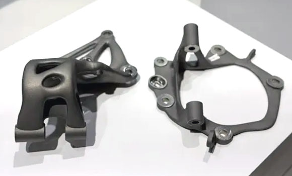 Titanium door hinge with integrated blades and base plate, approximately 50% lighter than cast aluminium or iron (Courtesy BLT)