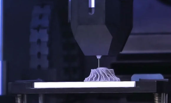 The Gauss MT90By replaces high-power lasers and heating with a high-efficiency paste system (Courtesy MetalPrinting)
