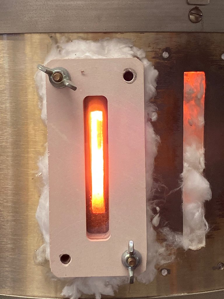Fig. 5 GRX-810 creep testing at 1,315°C (2,400°F) (Courtesy NASA)