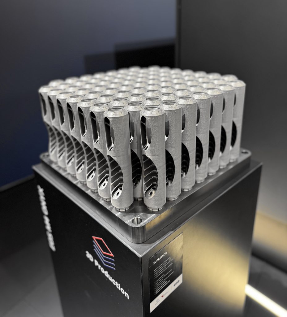 Fig. 10 Manufactured on the EOS M4 ONYX, this plate of eighty-one titanium suppressors took less than 29 hours to build (Courtesy Metal AM)