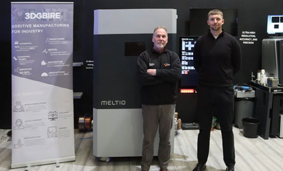 (Left) Stewart Powlesland, Welding Alloys, and Adam Nichols, 3DGBIRE, in front of a Meltio Additive Manufacturing machine (Courtesy Welding Alloys)
