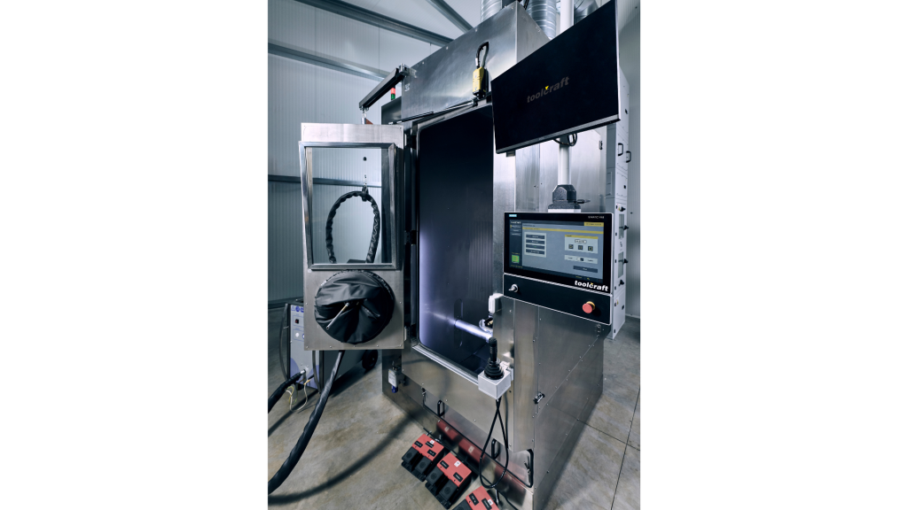 Fig. 13 SupportBlaster 320-HA dry-ice blasting system with cabin door open (Courtesy toolcraft)
