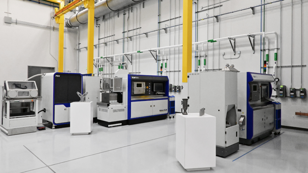 Fig. 4 Nikon SLM Solutions SLM®500 (centre) and SLM®280 (right) PBF-LB machines installed in Long Beach (Courtesy Nikon)