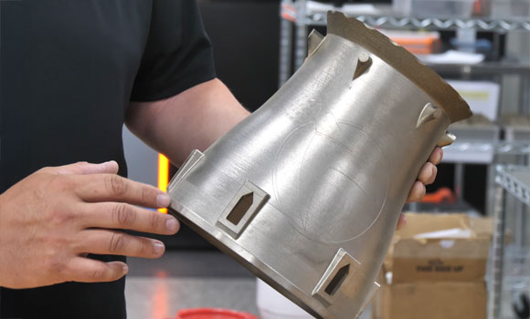 The additively manufactured afterburner casing for the hypersonic propulsion system combines several components into one part (Courtesy Renishaw)