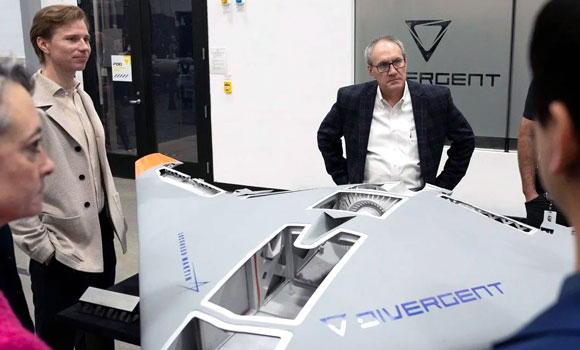 Members of Lockheed Martin’s leadership team discuss the Replicator during a recent visit (Courtesy Lockheed Martin)