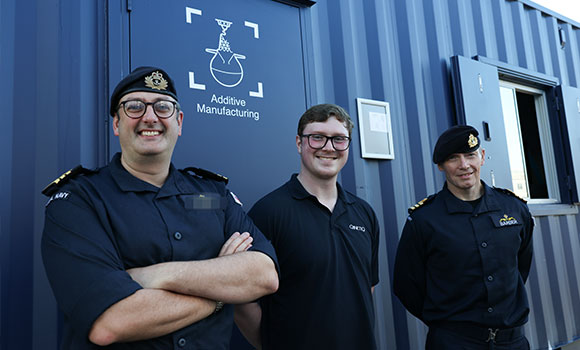 HMNB Clyde's Additive Manufacturing Team leaders meet in front of their new workshops (Courtesy UK MOD)