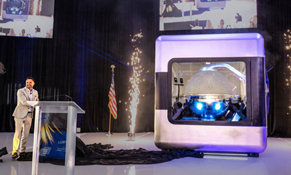 AMPERA founder and CEO Brian Matthews reveals the first full-scale additively manufactured reactor module (Courtesy PRNewsfoto/AMPERA)