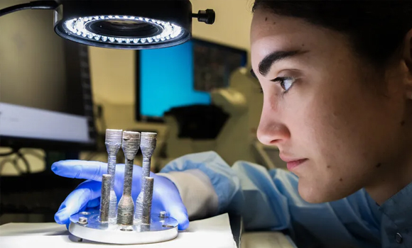 These samples additively manufactured in space are being inspected under a microscope (Courtesy ESA)