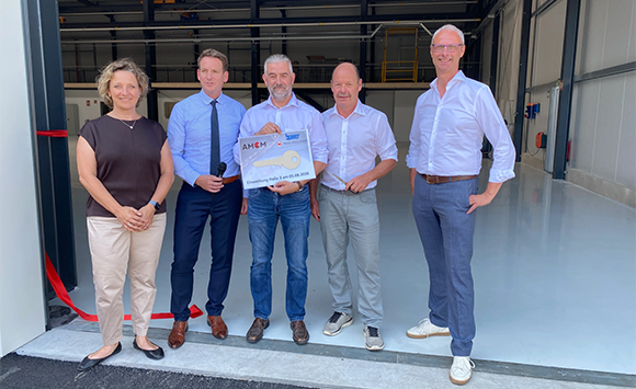 The official handover of the key marked the transfer of the new production facility to AMCM. From left: Barbara Christ (CEO, Bauer Unternehmensgruppe), Lutz Lindner (CEO, Maschinologen), Stefan Bischof (Director of Engineering, Operations & Production, AMCM), Stephan Groll (Sales, Bauer Maschinen und Technologie), Martin Bullemer (Managing Director AMCM) (Courtesy AMCM)