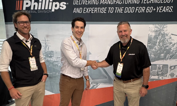 From left: Phase3D’s Ben Ferrar and Michael Brennen with Phillips Federal’s Tim McClanahan following the announcement of the companies’ new partnership (Courtesy Phase3D)