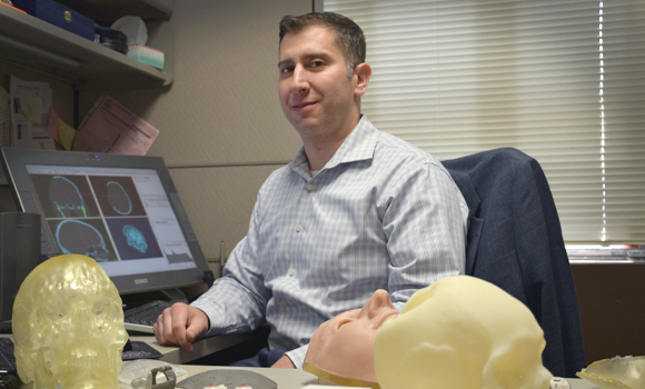 Peter Liacouras, director of services for Walter Reed National Military Medical Center's 3D Medical Applications Center, designed a titanium cranial plate system that reconstructs complex cranial and facial defects (Courtesy WRNMMC)