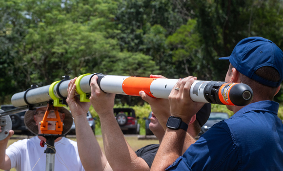 NPS researchers exploring applications of advanced manufacturing for low-cost missile design prepare an experimental rocket for launch during RIMPAC 2026 (Courtesy US Navy/Mass Communication Specialist Seaman Katherine Eldridge)