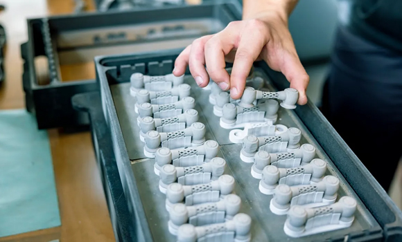 Serial Production of AM parts with Binder Jetting at Additive Willmann (Courtesy amsight)