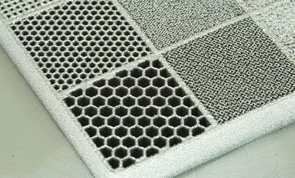 An electrolyser cell with a graded porous transport layer made of pure titanium and produced using PBF-LB (Courtesy Fraunhofer ILT)