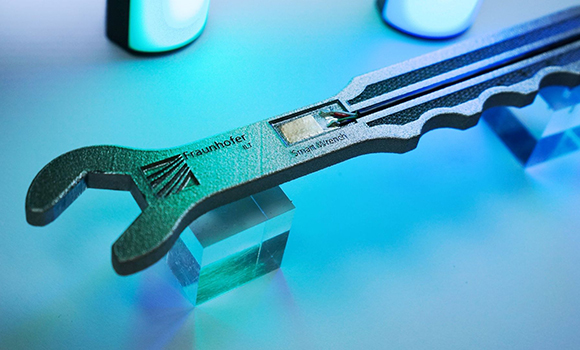 Integrated strain gauge in an additively manufactured wrench, where the sensor measures deformation and stress directly in the component (Courtesy Fraunhofer ILT)