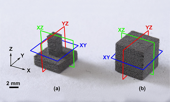 Binder-jetted 316L stainless steel specimens used to investigate anisotropic shrinkage during sintering. The coloured planes indicate the orientations analysed in the study. (Courtesy Grippi et al./npj Advanced Manufacturing)