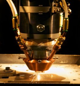 Fig. 4 LENS Engine system in preparation for America Makes Open House [1]