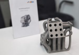 Fig. 12 A number of metal AM parts were displayed at MAMC 2014, including this AlSi10Mg distributor housing manufactured by Citim