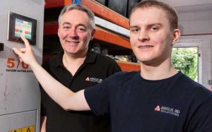Angus 3D Solutions is investing over £165,000 as part of its growth plan which includes the employment of a new Additive Manufacturing apprentice Ritchie Webster (R) pictured with Managing Director Andy Simpson (L) (Courtesy Angus 3D Solutions)