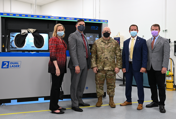 Left to right: Amy Gowder, president & CEO of GE Military Systems; John Sneden; Maj. Gen. Jeff King; Geoffrey Camp, Director of Oklahoma’s Aerospace and Defense initiative and Chris Schuppe, General Manager of Engineering and Technology at GE Additive (Courtesy Air Force Materiel Command)