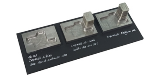 From left to right: the CNC machined part, the part with the metal 3D printed addition and the post-processed part (Courtesy Eplus3D)