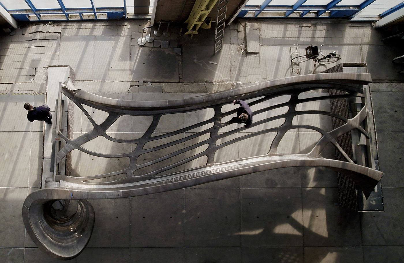 Fig. 1 The MX3D Bridge designed by Joris Laarman Lab, seen from above in MX3D's workshop during production (Courtesy Joris Laarman Lab)