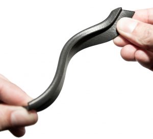 Fig. 6 This closeout seal for the rear spoiler of the 2022 Chevy Tahoe was produced using polymer AM on HP’s Multi Jet Fusion machines by Forecast 3D, a GKN Additive company, enabling a late-stage design change. 60,000 of these parts have been delivered to date (Courtesy GKN Additive)