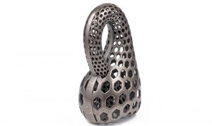 Fig. 10 Bathsheba Sculpture turned the Klein bottle, a topological example of a non-orientable surface that yields a shape without a definable inside or outside, into a practical bottle opener. This mix of math joke and functional product is an ideal example of the intersection between art and engineering for AM (Courtesy Bathsheba Grossman)