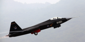 A Chinese FC-31 stealth fighter jet takes off during a demonstration flight ahead of the 2014 China International Aviation and Aerospace Exhibition (Courtesy Xinhua)