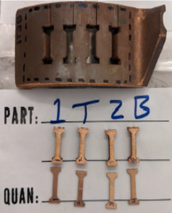 Fig. 8 Microtensile specimens excised from an untested chamber at location of the suspect witness line (Courtesy NASA)