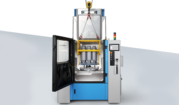 Solukon has equipped its SFM-AT1000-S automatic depowdering system with an optimised swivel arm for parts made using the NXG XII 600 (Courtesy Solukon)