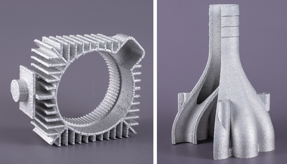 A heat Sink (left) and a fluid distribution nozzle (right) produced using the ElemX (Courtesy Xerox)