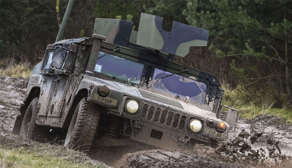 The M998 Humvee at the 7th Army Training Command’s Grafenwoehr Training Area, Germany (Courtesy Gertrud Zach, US Army)