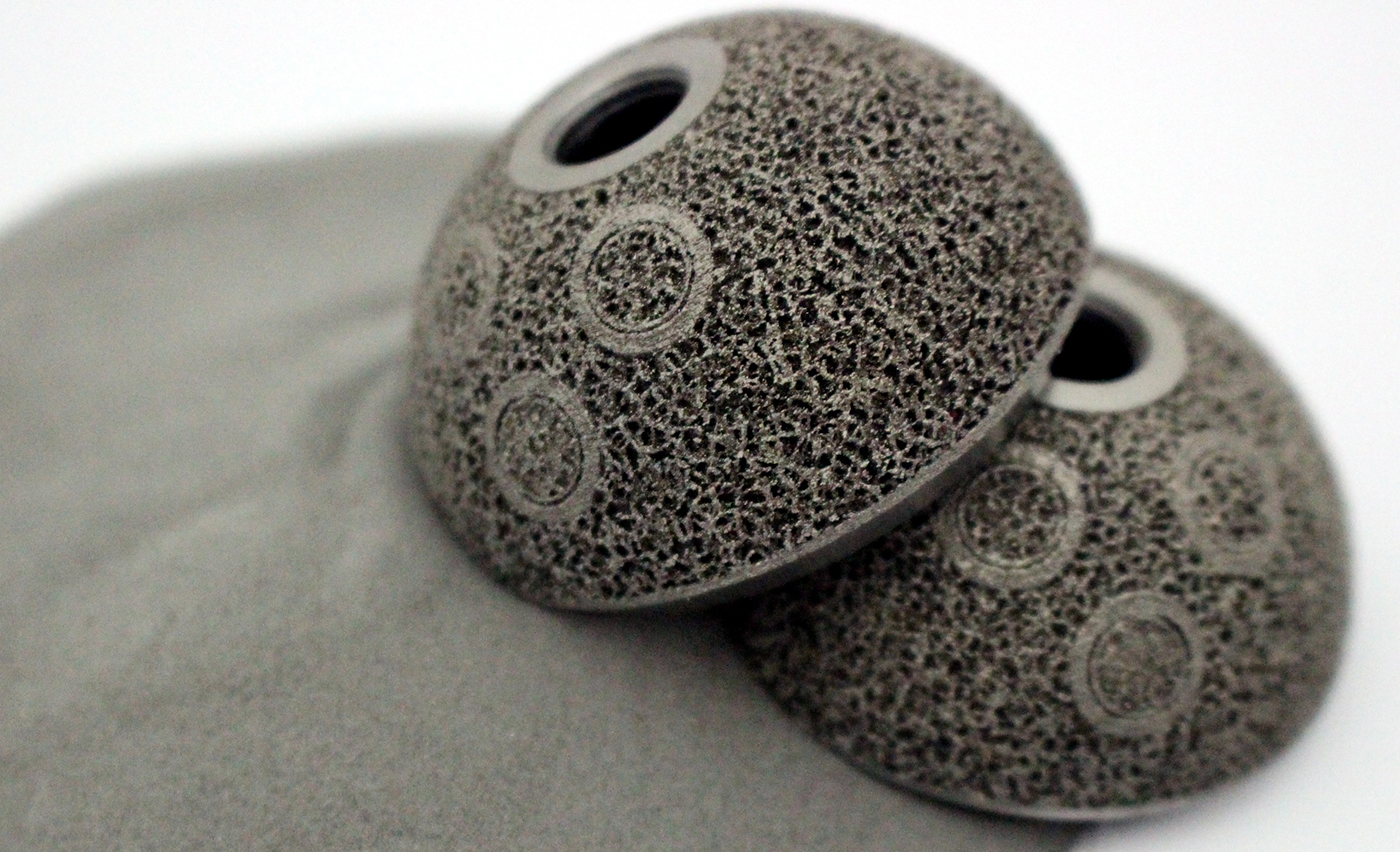 Fig. 1 AM acetabular cups produced by implantcast GmbH (Courtesy implantcast GmbH)