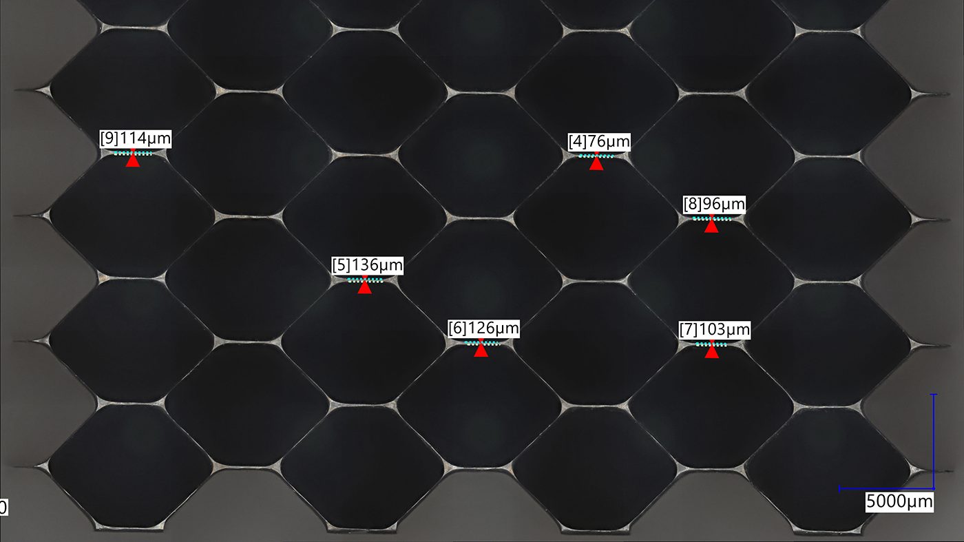 Fig. 13 A6061-RAM2 honeycomb lattice after REM processing for extreme wall thickness reduction [9] 