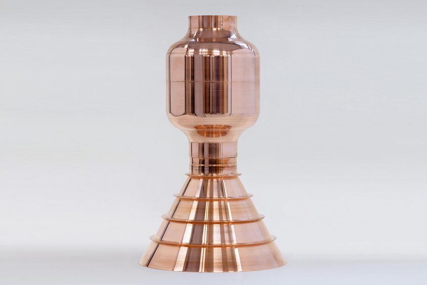 Fig. 1 A demonstrator rocket engine component post-machining. This was produced from copper using the DED-EB/W process and is 485 mm tall and 305 mm in diameter (Courtesy Pro-beam Additive GmbH)