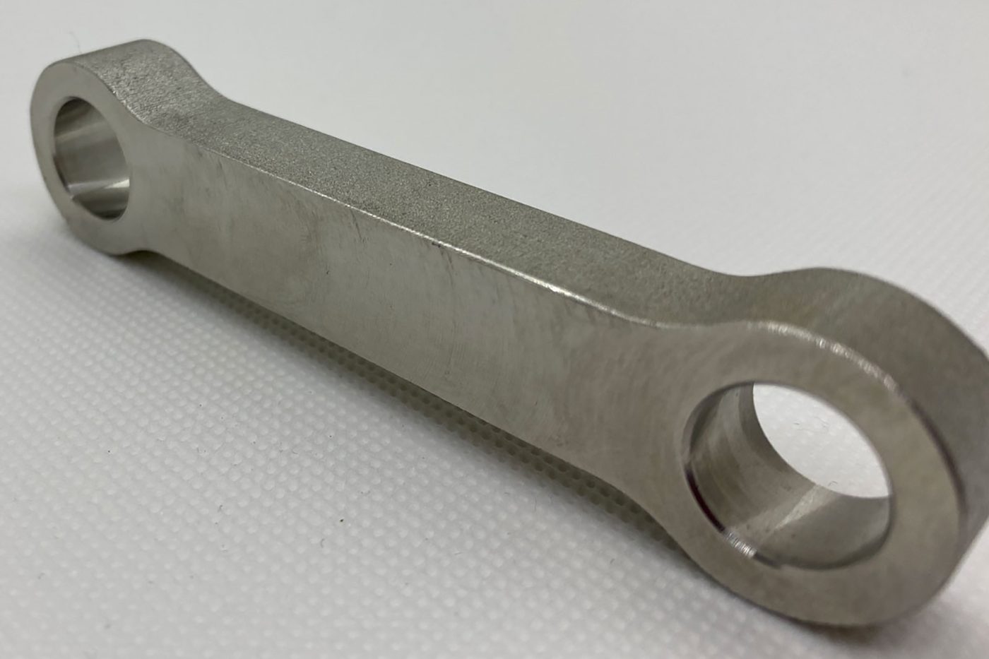 Fig. 5 The rail industry is increasingly adopting Additive Manufacturing to enhance maintenance operations and production efficiency. AM is utilised for creating spare parts, maintenance tools, and specialised components, effectively addressing challenges with obsolete parts and significantly reducing lead times. As adoption grows, ensuring high quality and safety becomes ever more critical. AM parts undergo extensive mechanical testing and validation to meet the stringent performance standards of the industry, such as the EN 45545-2 and DIN SPEC 17071. Standards such as ISO/ASTM 52920, which provides requirements for establishing quality-assured AM processes regardless of the AM technology used, and to guide manufacturers in maintaining consistency and reliability (Courtesy Deutsche Bahn)
