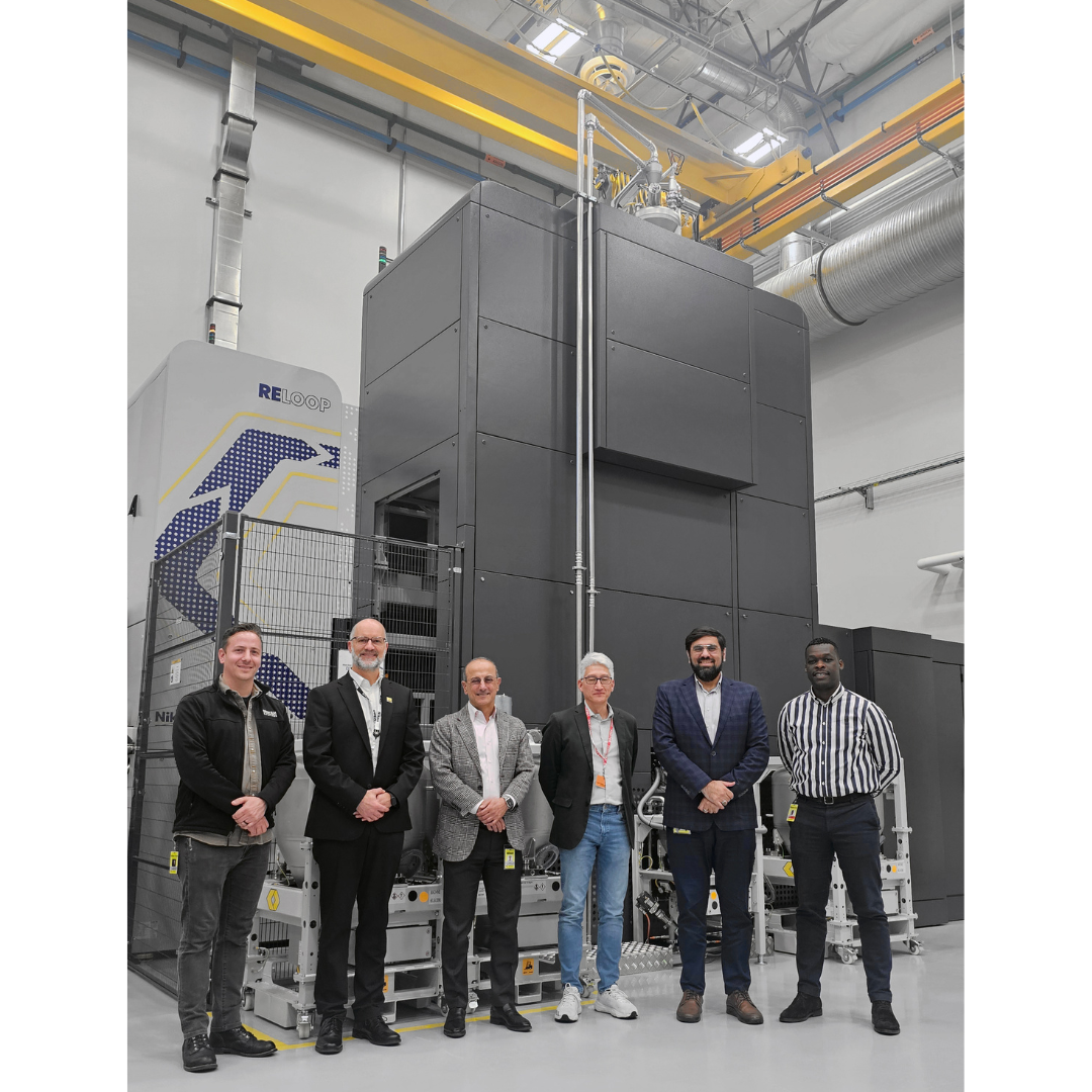 Fig. 5 NXG 600E with RELOOP powder management (build volume: 600 x 600 x 1,500 mm). Left to right: Joshua Forster, Jesse Lea, Hamid Zarringhalam, Martin McMahon, Behrang Poorganji, Nneji Kemakolam (Courtesy Nikon)